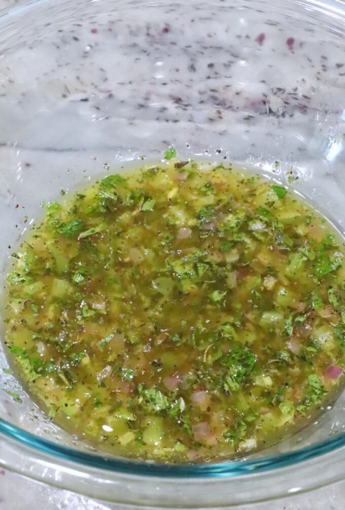 salad dressing with lemon juice in a glass bowl