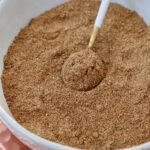 shawarma seasoning blend in a bowl with a small spoon