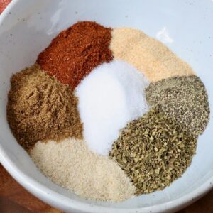 dried herbs and spices separated in a bowl