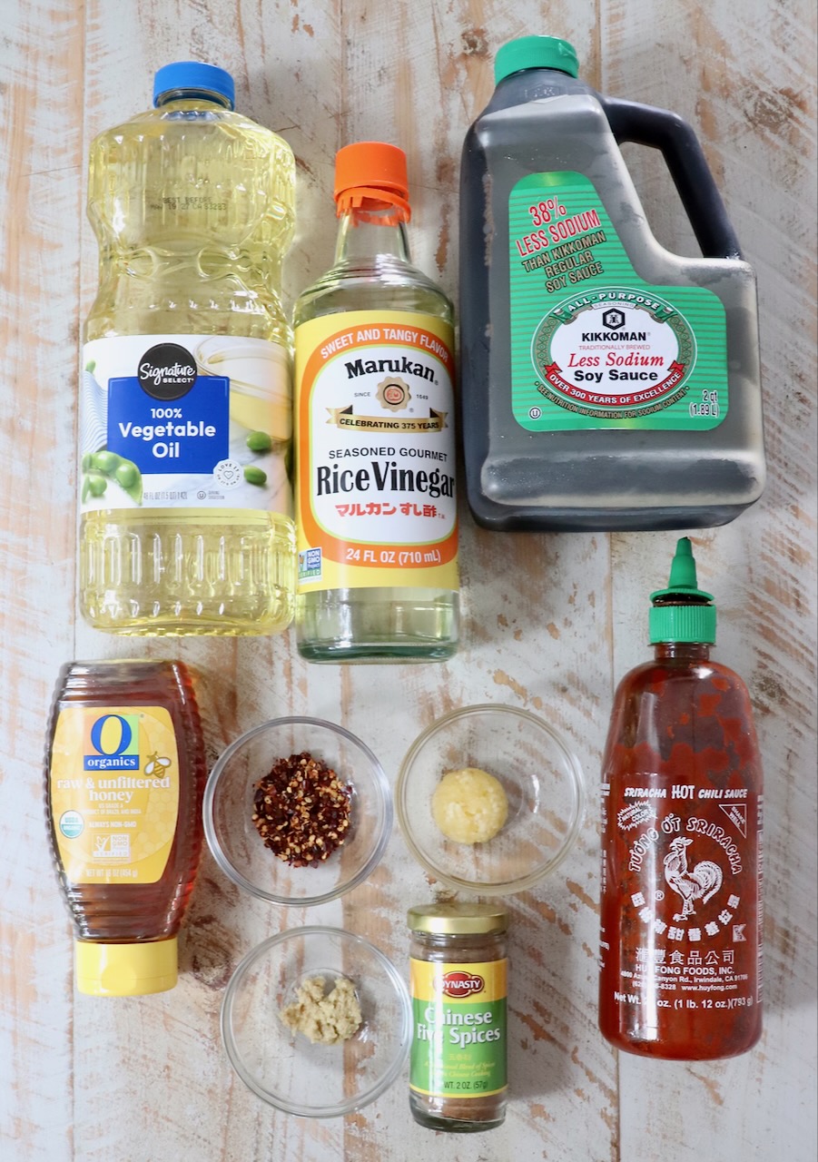ingredients for general tso sauce on a white wood board