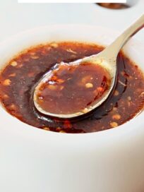 general tso sauce in a bowl with a spoon