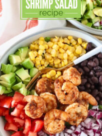 salad in a bowl topped with cooked shrimp, avocado, corn, black beans, tomatoes, and onions. Text overlay: "19 Minute Mexican Shrimp Salad Recipe"