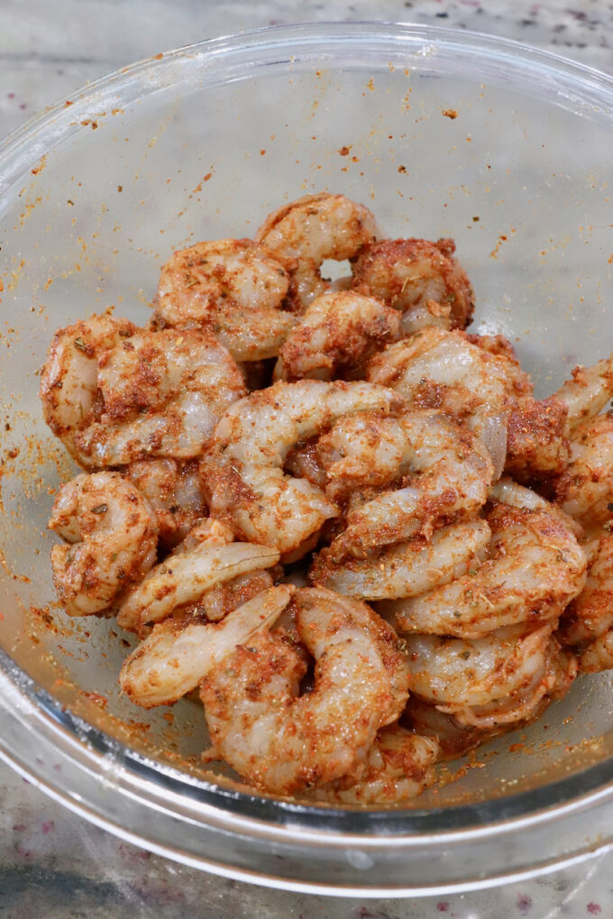 seasoned shrimp in a glass bowl