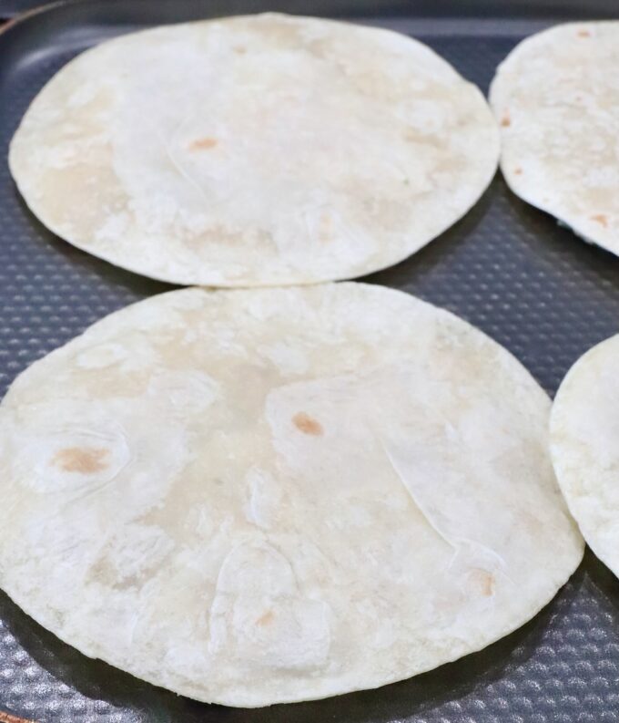 tortillas on a griddle