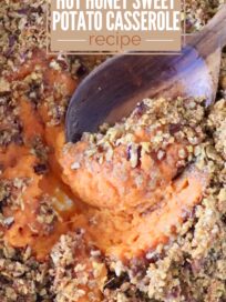 Close-up of a hot honey sweet potato casserole with a crumbly pecan topping. A wooden spoon scoops a portion. Overlay text reads: "Thanksgiving Side" and "Hot Honey Sweet Potato Casserole Recipe."