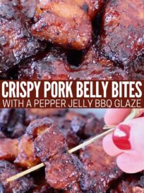 Close-up of crispy pork belly bites glazed with pepper jelly BBQ sauce. Rich, glossy texture with a skewer. Text overlay: "Crispy Pork Belly Bites with a Pepper Jelly BBQ Glaze."