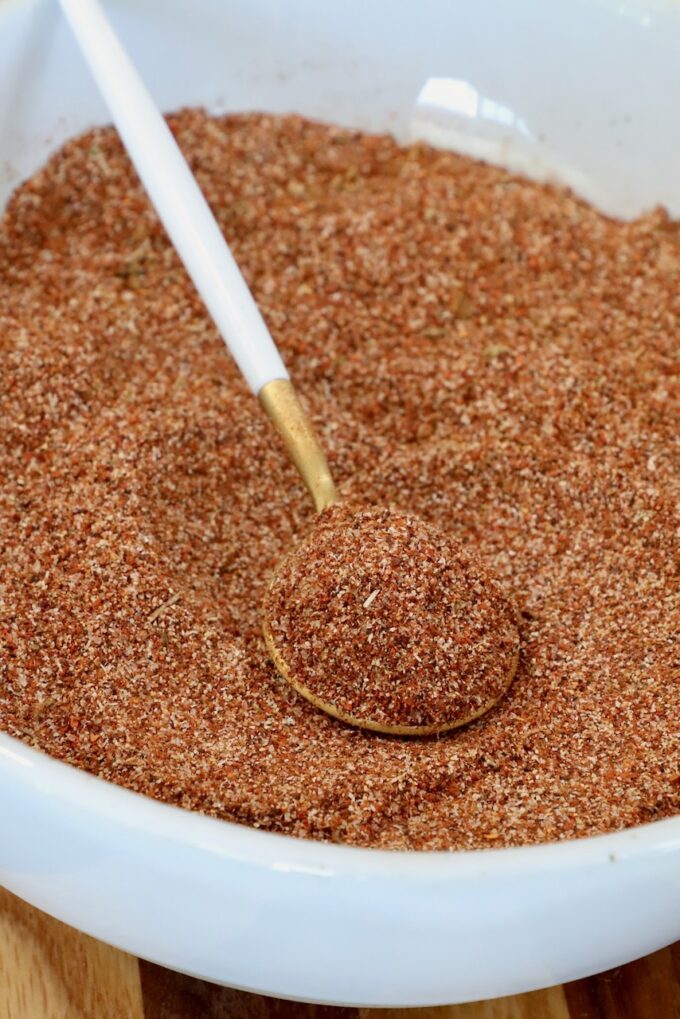al pastor seasoning mix in a bowl with a spoon