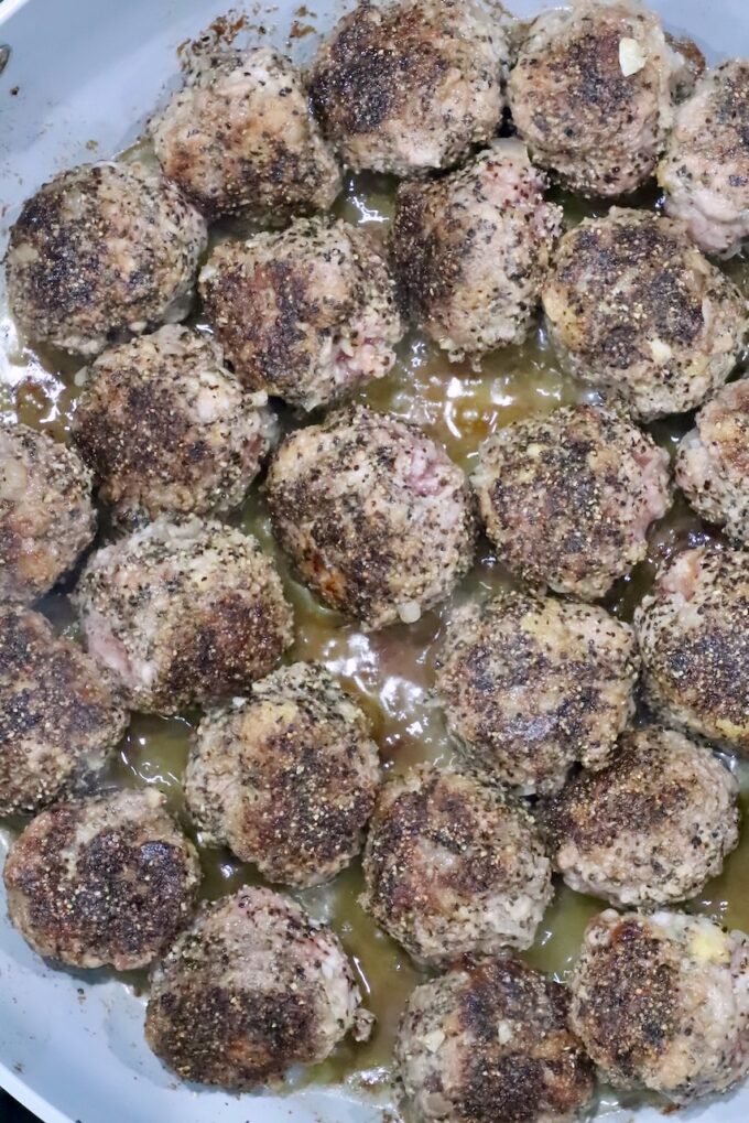 cooked meatballs in a skillet